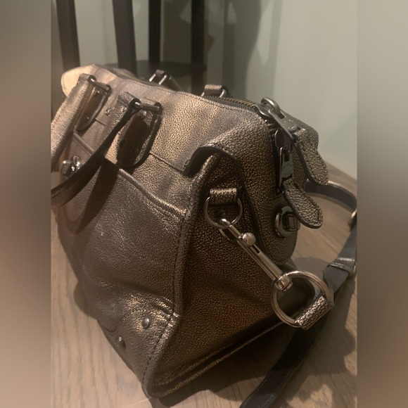 Dark Gold Coach Leather Bronze Satchel Purse
13" (L) x 9.5" (H) x 7" (W) - Picture 13 of 14